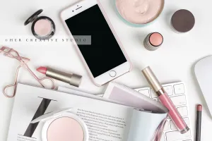 Makeup & Smart Phone on White Background, Styled Stock
